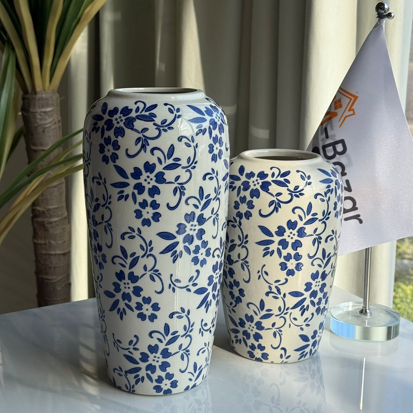 مجموعة مزهريات سيراميك زرقاء مزينة بالزهور