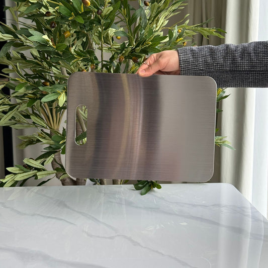 لوح تقطيع من الفولاذ المقاوم للصدأ المصقول بمقبض