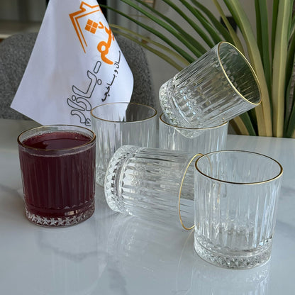 سێت پەرداخی شووشەی ڕوون و جوان بە ڕیمی زێڕین