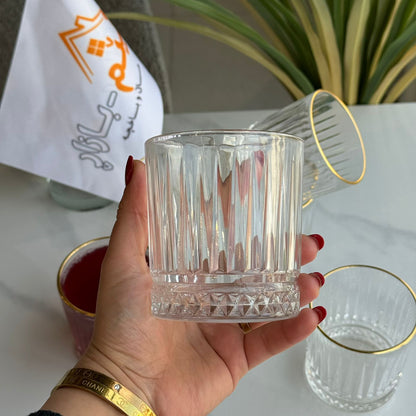 سێت پەرداخی شووشەی ڕوون و جوان بە ڕیمی زێڕین