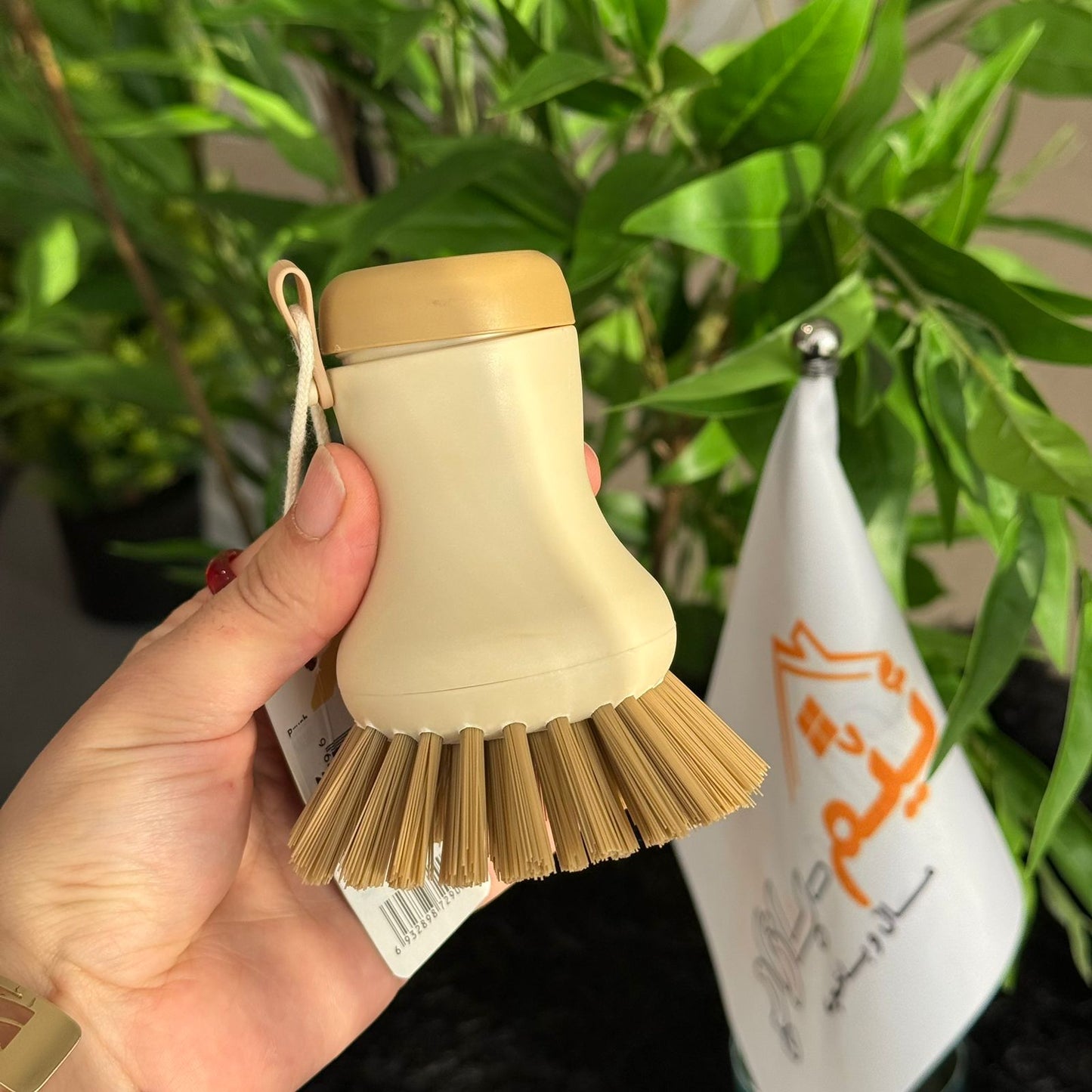 Soap-Dispensing Dish Cleaning Brush