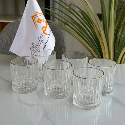 سێت پەرداخی شووشەی ڕوون و جوان بە ڕیمی زێڕین