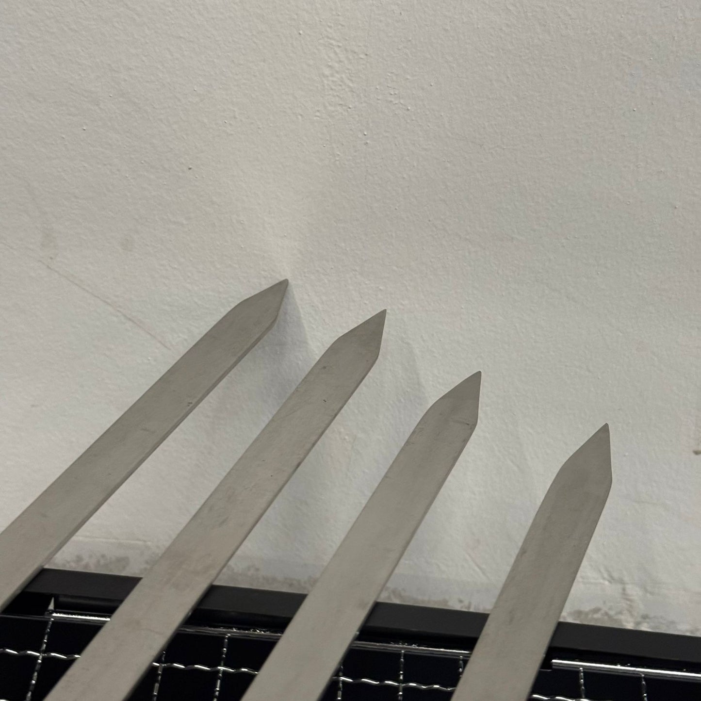 شیشەی برژاندنی بە هێز و کارا بە دەستە دار