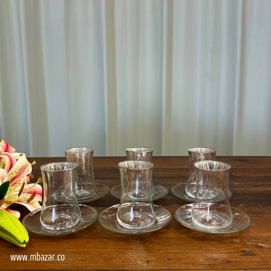 کوپێکی چای شووشەیی لێواری زیو و سێتێکی ساوسێر