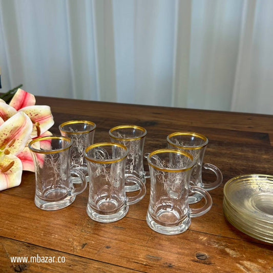 کوپێکی چای شووشەی لێواری زێڕین و سێتی ساوسێر